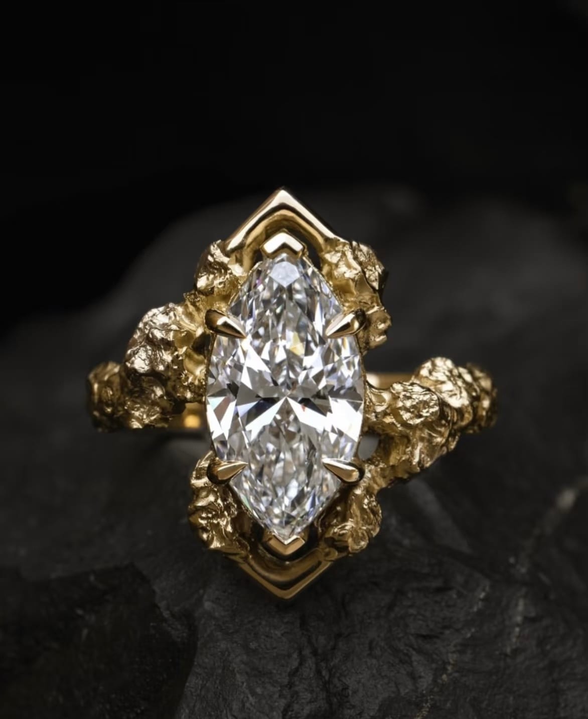 Marquise diamond ring with gold nugget shoulders